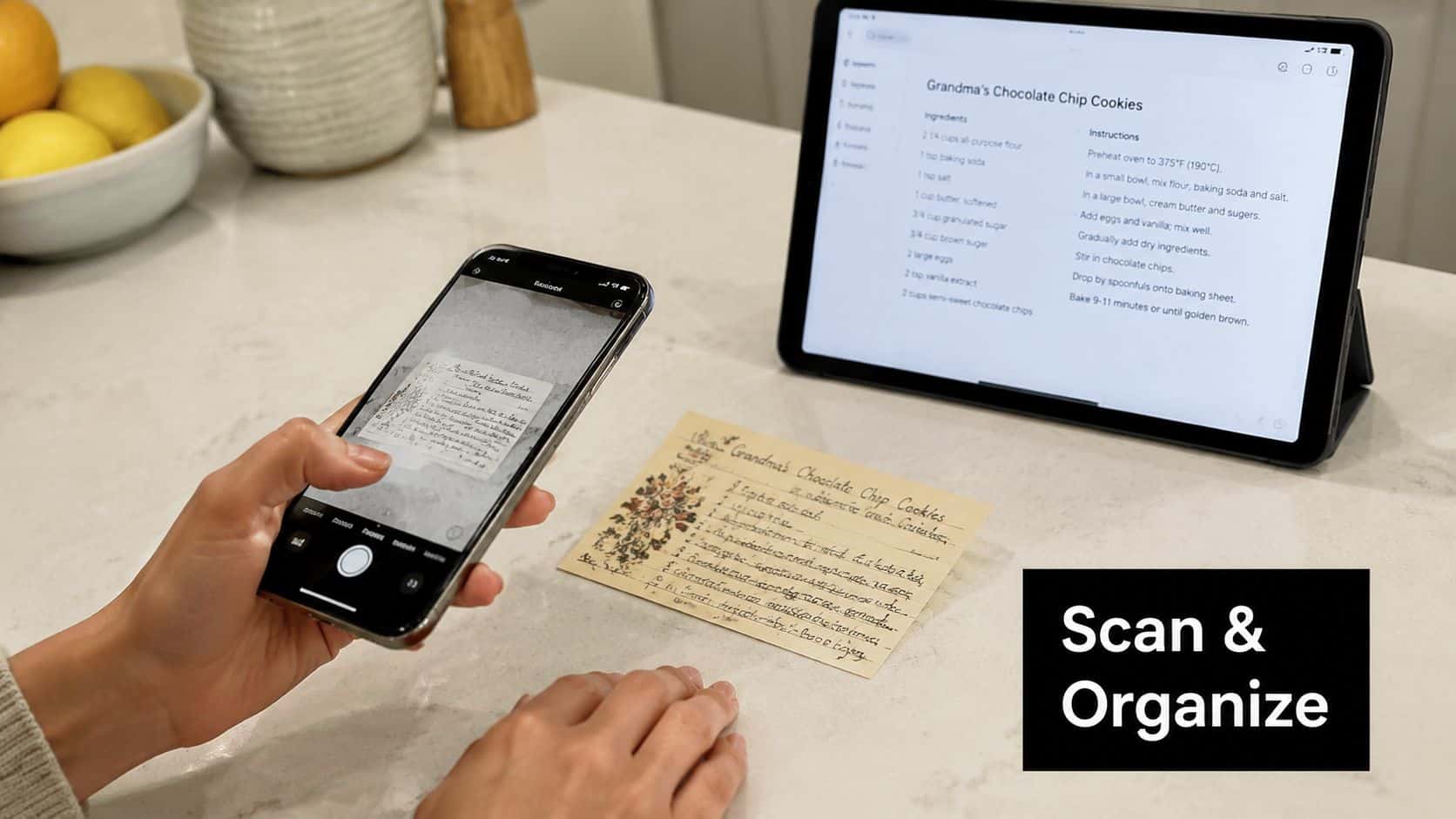 A person uses a smartphone to scan a handwritten recipe card, digitizing it onto a tablet device.